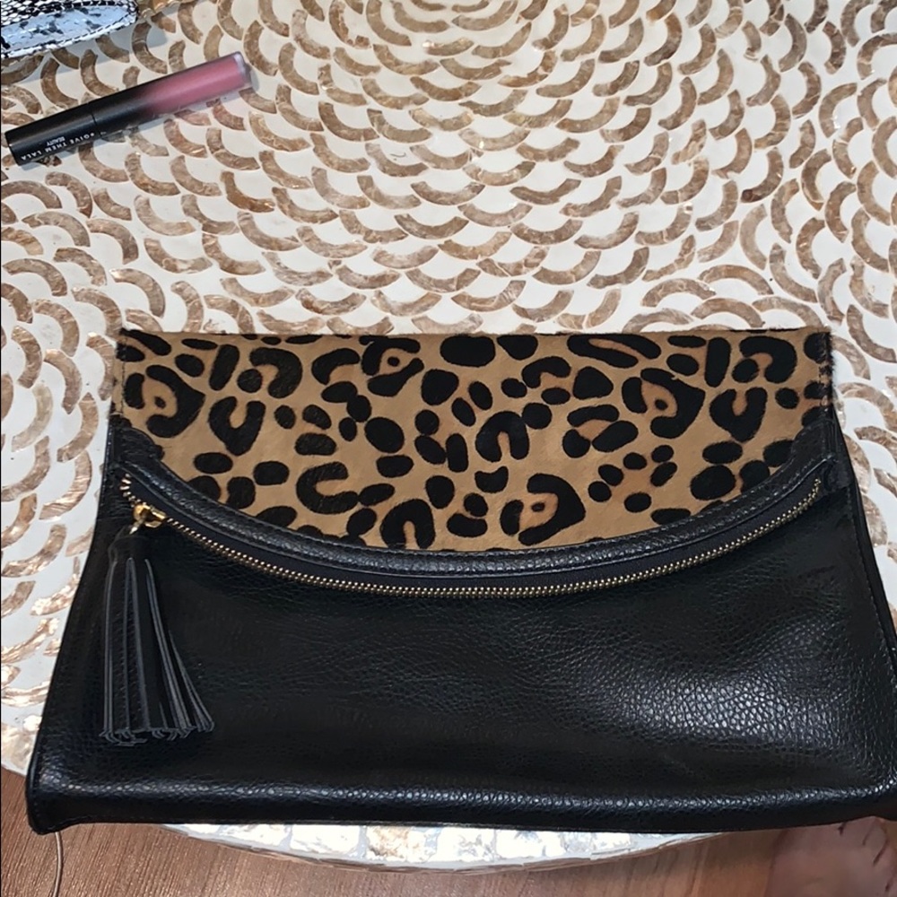 Leopard and black clutch